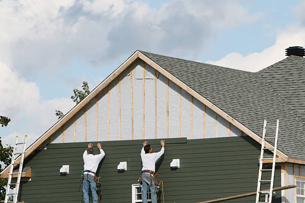 Professional Siding Contractor technician working in Arlington, NY